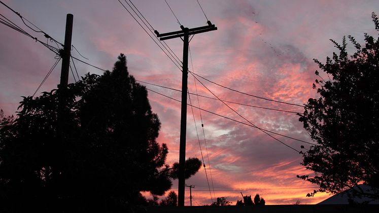power lines under clouds