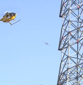 Helicopter Pulls Power Lines Across 57 Freeway as SCE Continues Work on Tehachapi Project