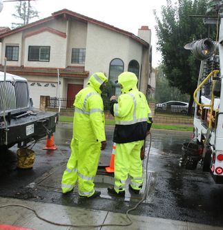SCE crews work in rain