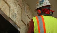 Crews Work to Repair Tiles at ‘The Pit’ in Time for Basketball Season