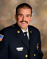 Local fire chief earns degree; receives Harvard Fellowship