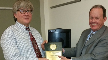 UNM scientist Victor Polyak receives Karst Water Institute Outstanding Scientist Award