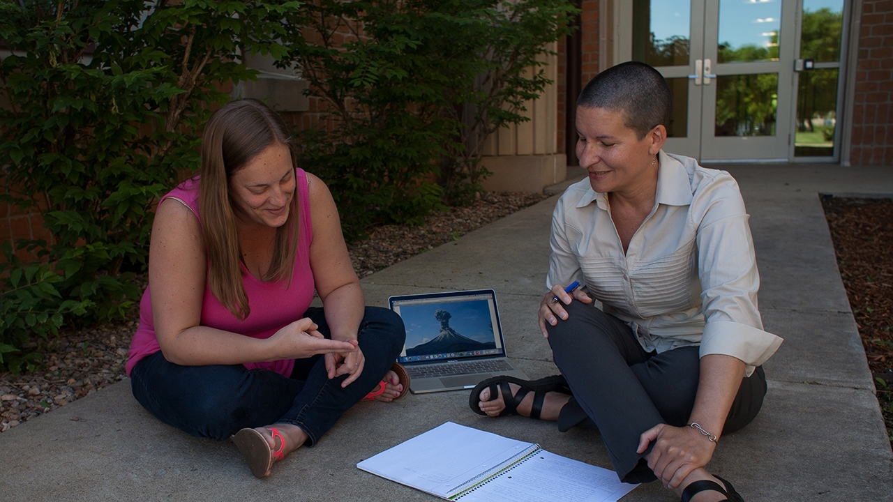 Holly Olivarez visits with mentor