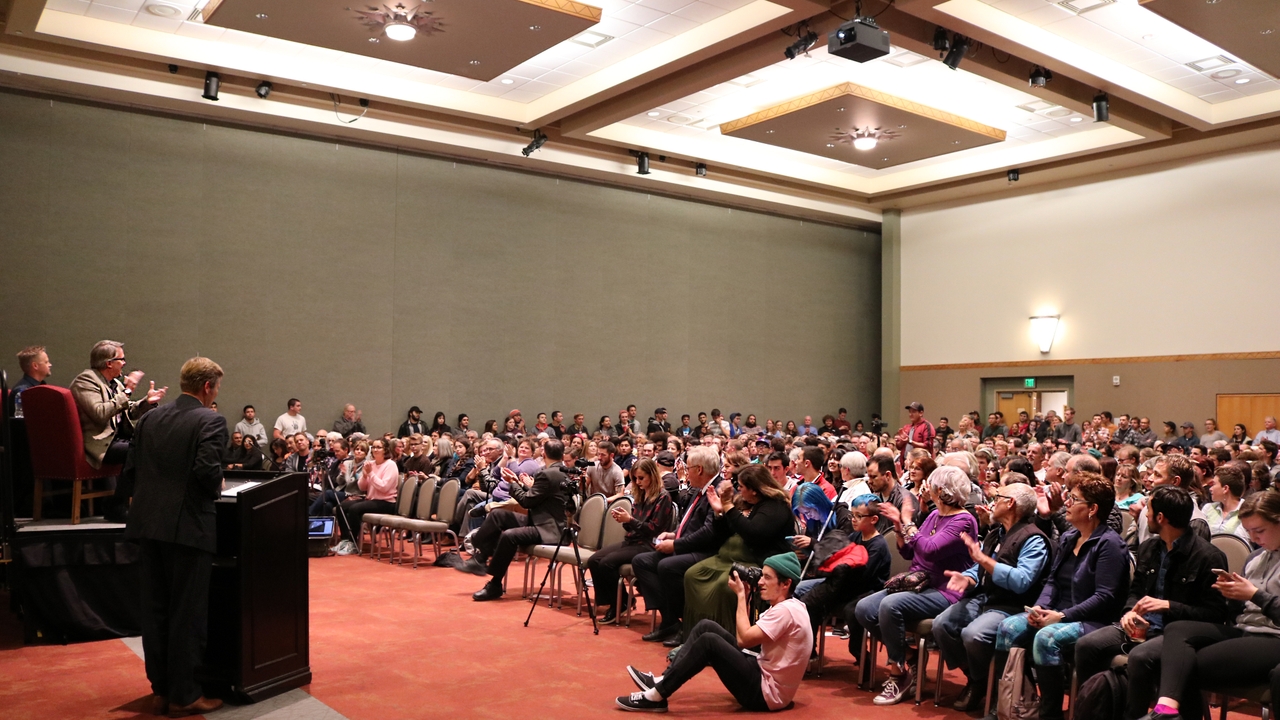Mayor Tim Keller introduces Vince Gilligan to a packed UNM audience