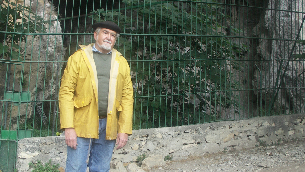 Lawrence Straus outside of the site of his