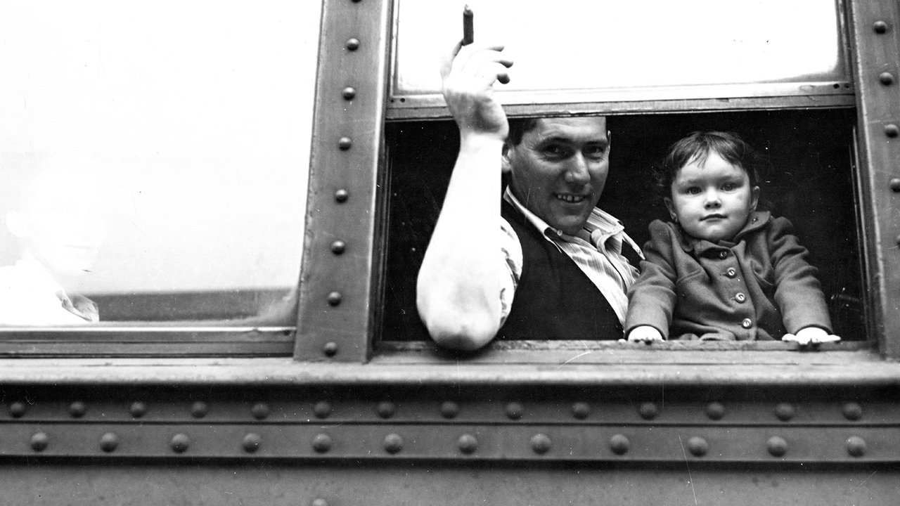 Migratory farm worker and his little girl