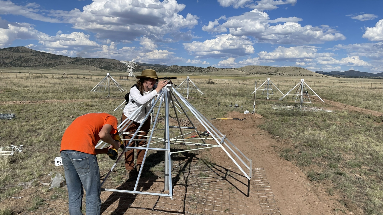 Team working on assembling antennas