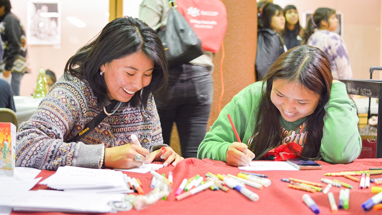Students write and color.