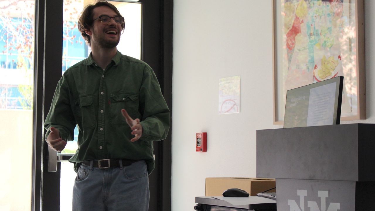 Spenser Willden gives presentation. 
