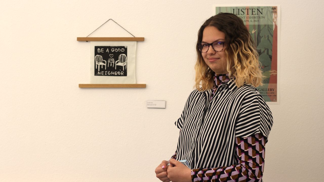 Students present artwork at Spectra Gallery.