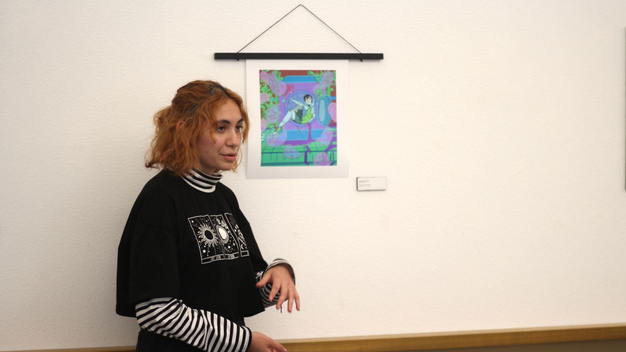 Students present artwork at Spectra Gallery.