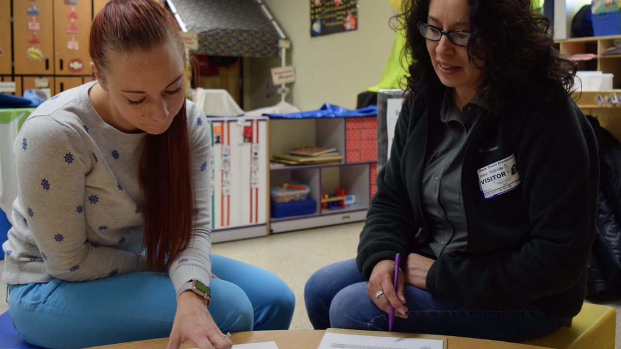 COEHS student works with families. 