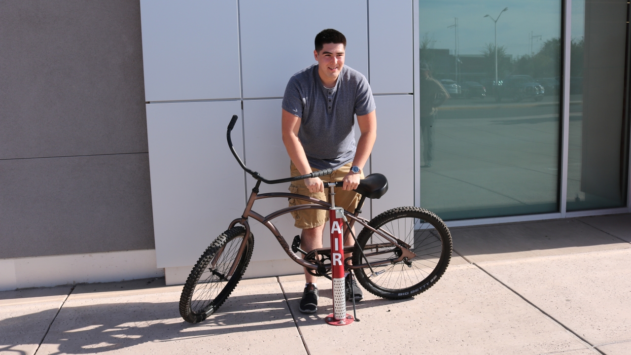 Nicolas Estrada with the new UNM bike shop
