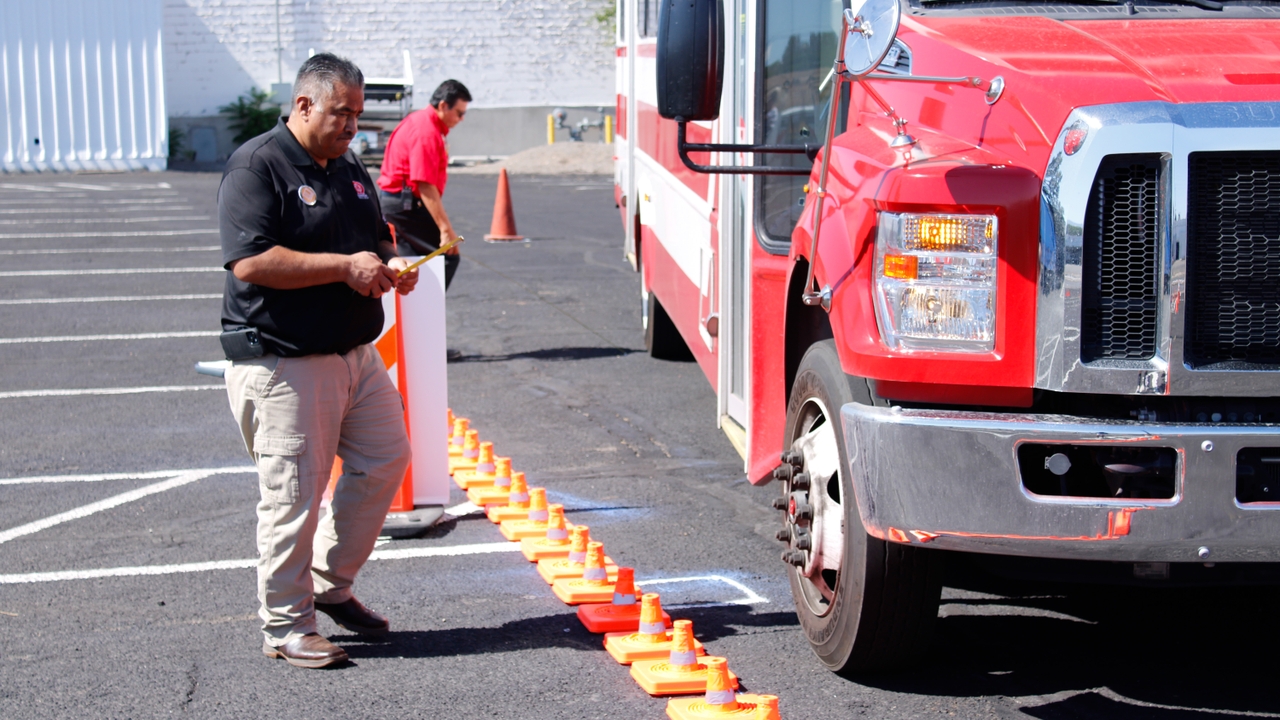 Roadeo committee judge assessing the bus driver 