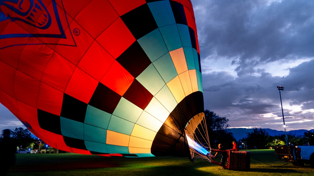Inflating 'Cherry On Top' at dawn.