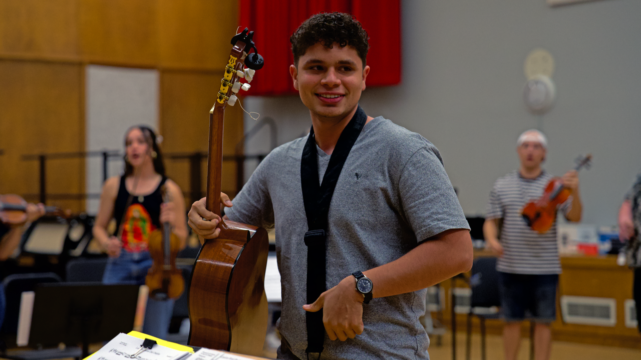 Student soloist performs in practice 
