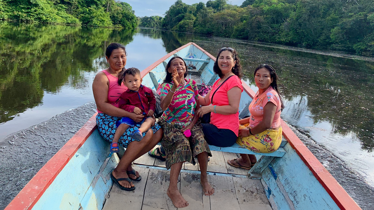 Rosa Vallejos-Yopán traveling with collaborators to a Secoya village.