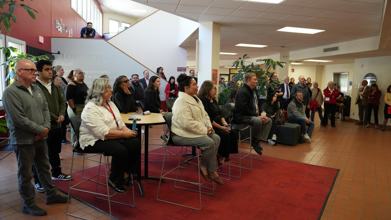 Transfer and Transition Student Center attendees at the ribbon-cutting.