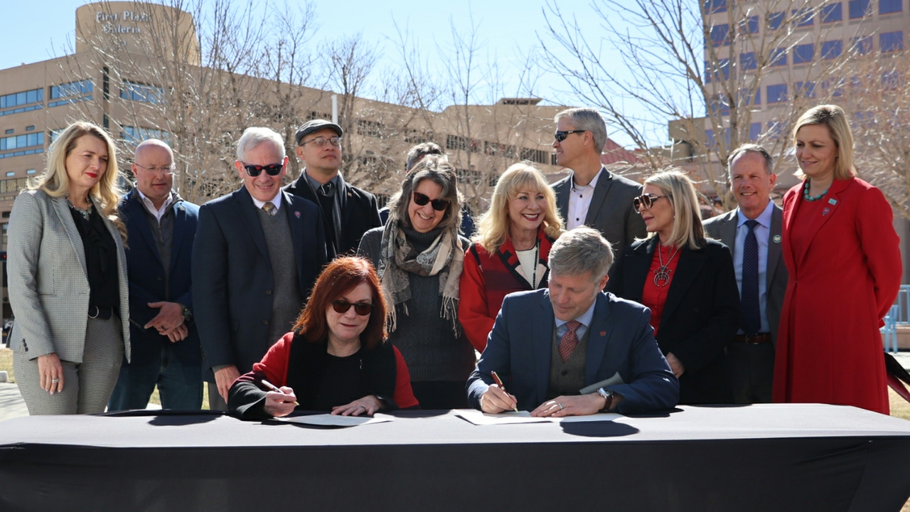 UNM President Garnett S. Stokes and 