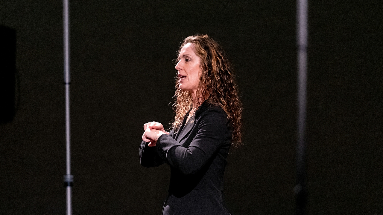 A sign language interpreter presents