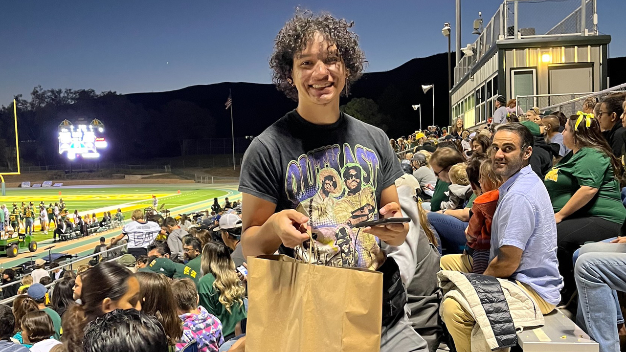 Dropping food to fans 
