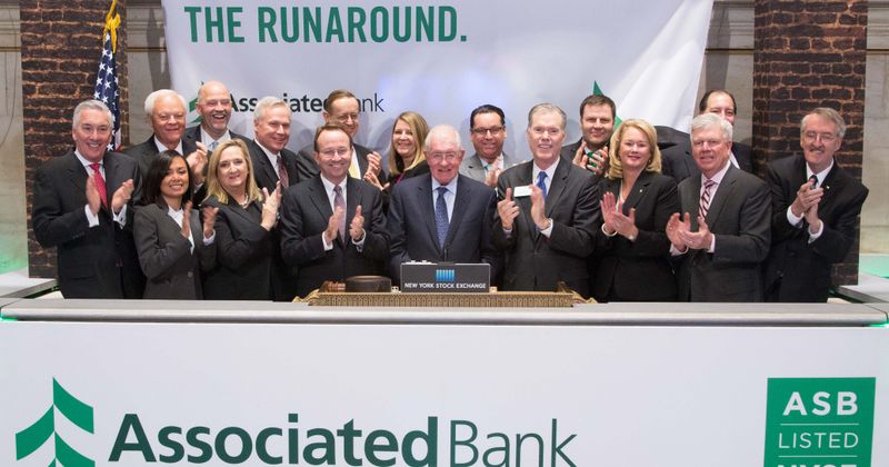 Associated Bank knocks down notion of banking barriers, celebrates transfer to NYSE with The Opening Bell
