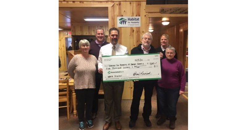 Associated Bank donates $5,000 to Habitat for Humanity of Sawyer County