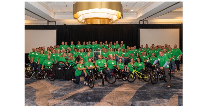 Children at Boys & Girls Clubs of Greater Milwaukee receive 15 new bikes from Associated Bank leadership team volunteer activity