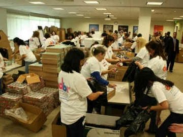 Dunkin’ Brands Employees Join Together to Stuff 3,000 Back Packs for The Greater Boston Food Bank