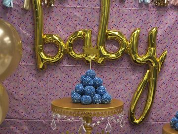 How to Throw a Dunkin’-Inspired “Baby Sprinkle” Fit for Royalty