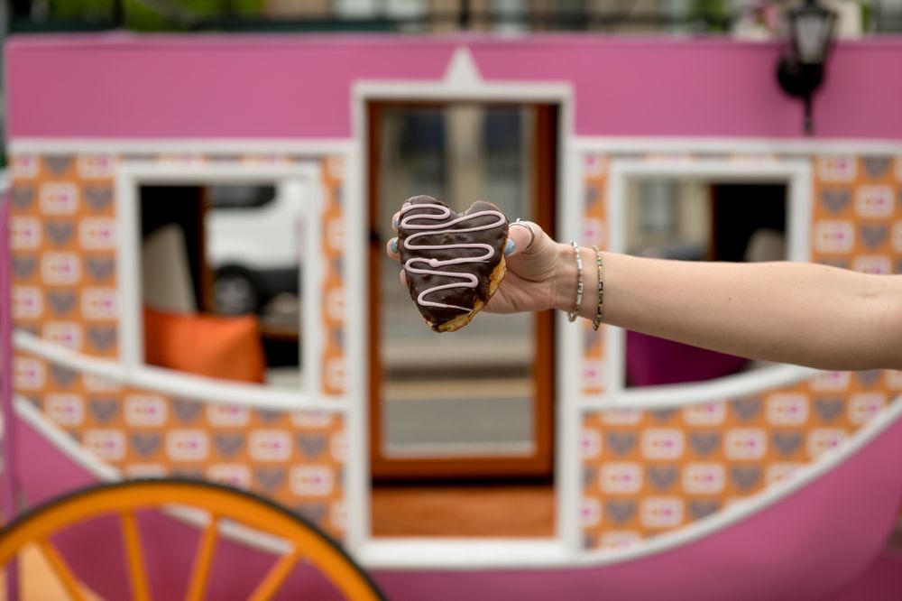 Princess Carole Radziwill Surprises Guests in Dunkin’-Inspired Royal Carriage