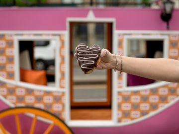 Princess Carole Radziwill Surprises Guests in Dunkin’-Inspired Royal Carriage