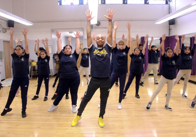 AIE Teaching Artist Cedric Green leads AileyDance Kids at Dual Language Middle School