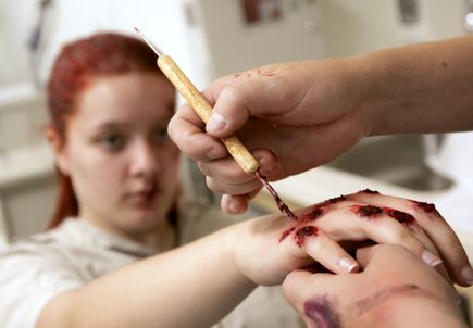 Fake, but gruesome injuries up the ante in health care simulation
