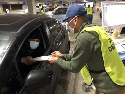 Drive-through COVID-19 vaccine clinics