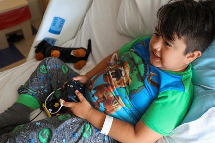Kids at Doernbecher Children's Hospital play newly donated Xbox systems and games