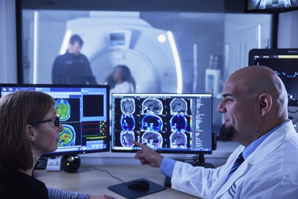 Ramon Barajas, Jr., M.D., in lab