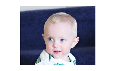Dying baby gains strength in his parents’ loving arms