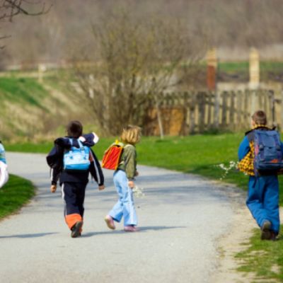 Two boys and two girls going to school