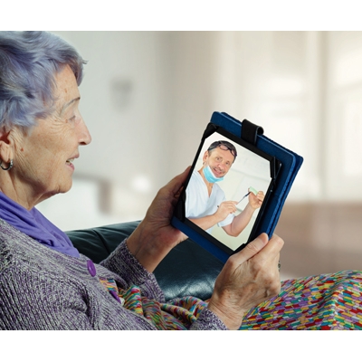Senior-looking-at-tablet-we