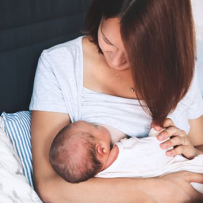 Mother breastfeeding infant