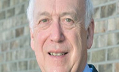 Dr. Bill Calnon Honored for Distinguished Service