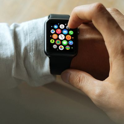 man-looking-at-apple-watch