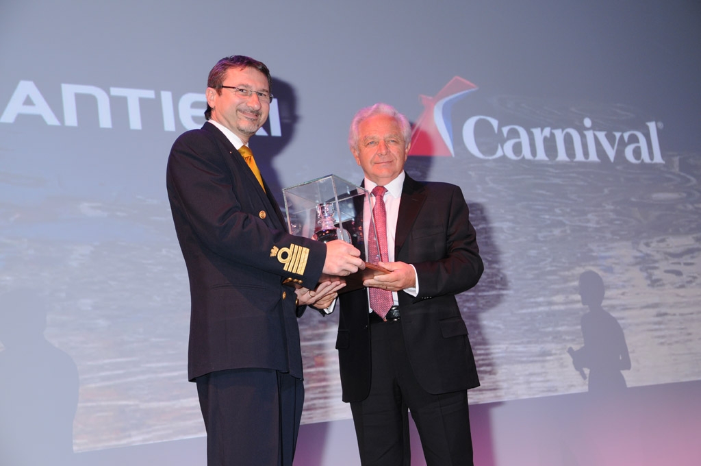 Carnival Breeze Captain Vincenzo Alcaras is presented with commemorative gift by Fincantieri's Yard Director Mr. De Marco