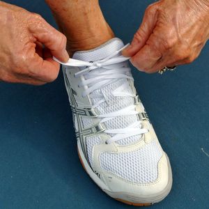 Woman lacing up