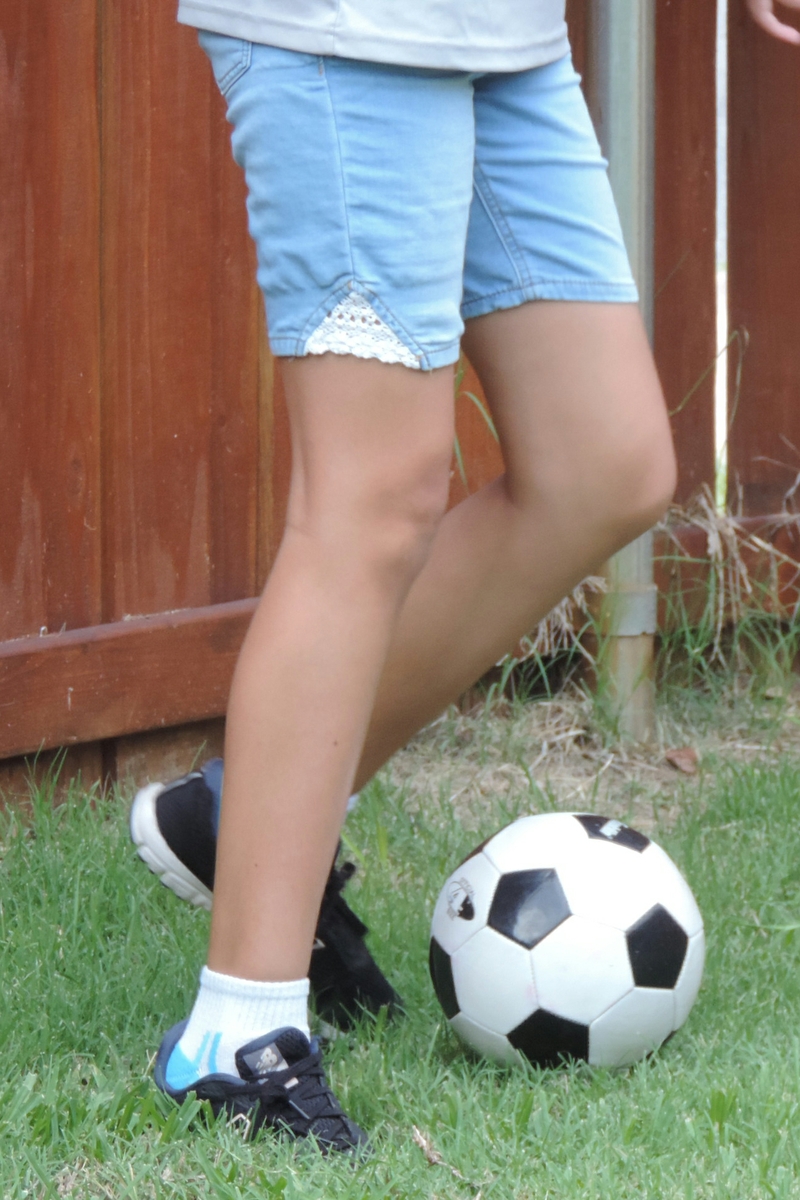 Kicking soccer ball