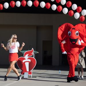 Participants dance and warm up on stage at the 2023 Kern County Heart and Stroke Walk