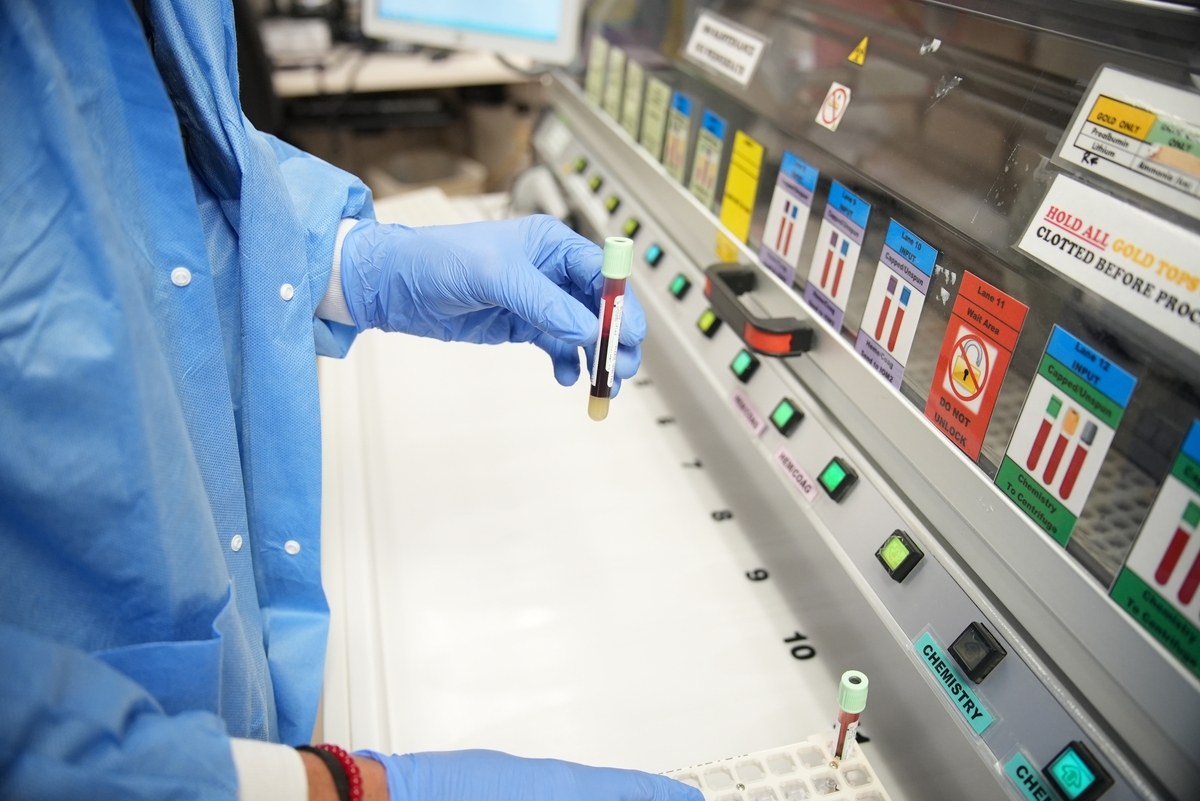 Blood vials being processed