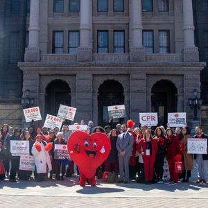 Dozens of Texas advocates rally support in front of the Capitol for Cardiac Emergency Response Plans in schools during Heart Month