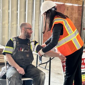 Blood pressure screening on Hard Hats with Heart job site